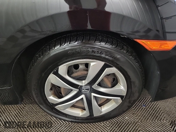 2017 Honda Civic LX with VIN 2HGFC2F58HH575889, listed as a IAAI auction lot 42285632 with 63,687 mi miles and . Bid and sale history available at DreamBid. Image 26.