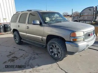 2001 GMC Yukon SLT with VIN 1GKEK13T11R164029, listed as a IAAI auction lot 41518776 with 329,836 mi miles. Bid and sale history available at carsss.com. Image 1.