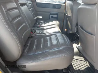 2003 Hummer H2 with VIN 5GRGN23U93H108017, listed as a IAAI auction lot 41793034 with 203,739 mi miles. Bid and sale history available at carsss.com. Image 8.