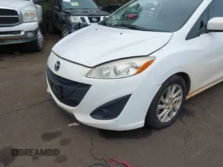 2012 Mazda 5 Sport with VIN JM1CW2BL7C0115861, listed as a IAAI auction lot 41957762 with 133,249 mi miles. Bid and sale history available at carsss.com. Image 19.
