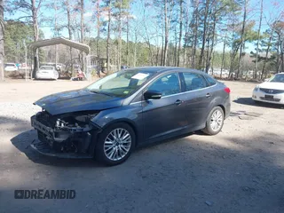 2015 Ford Focus Titanium with VIN 1FADP3J25FL333743, listed as a IAAI auction lot 41857057 with 120,917 mi miles and . Bid and sale history available at carsss.com. Image 18.