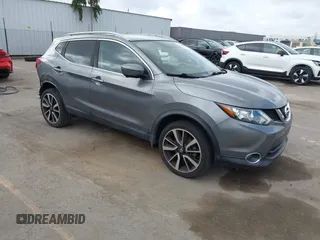 2017 Nissan Rogue S with VIN JN1BJ1CP2HW017091, listed as a IAAI auction lot 41906749 with 74,591 mi miles and . Bid and sale history available at DreamBid. Image 1.