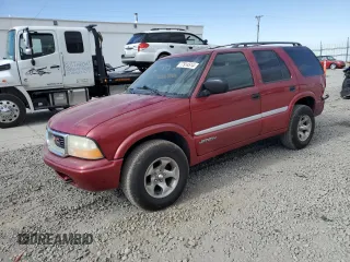 2000 GMC Jimmy SLE Convenience with VIN 1GKDT13W0Y2292445, listed as a Copart auction lot 77914514 with 220,291 mi miles and Salvage Title. Bid and sale history available at carsss.com. Image 1.