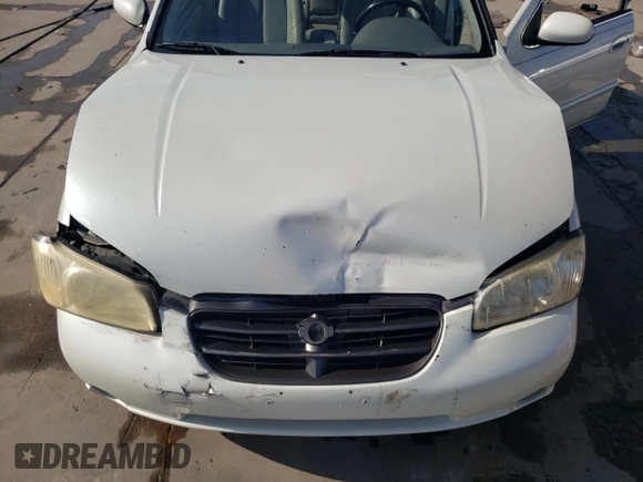 2000 Nissan Maxima GXE z VIN JN1CA31D2YT523871, wystawiony jako Copart lot #65902984 z przebiegiem 235 064 mil mil oraz Szkoda całkowita • Salvage title. Historia ofert i sprzedaży dostępna na DreamBid. Obrazek 11.