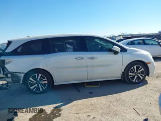 2018 Honda Odyssey Elite with VIN 5FNRL6H94JB065862, listed as a IAAI auction lot 41382127 with 101,774 mi miles and . Bid and sale history available at DreamBid. Image 13.