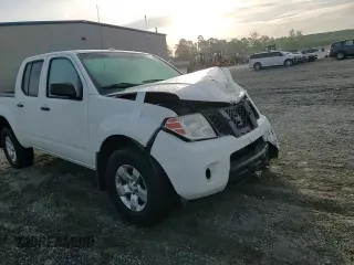 2012 Nissan Frontier Pro-4X с VIN 1N6AD0EV6CC406748, выставлен на аукционе Copart как лот 53846685 с пробегом 148 783 миль миль и Списание • Salvage title. История ставок и продаж доступна на DreamBid. Изображение 13.