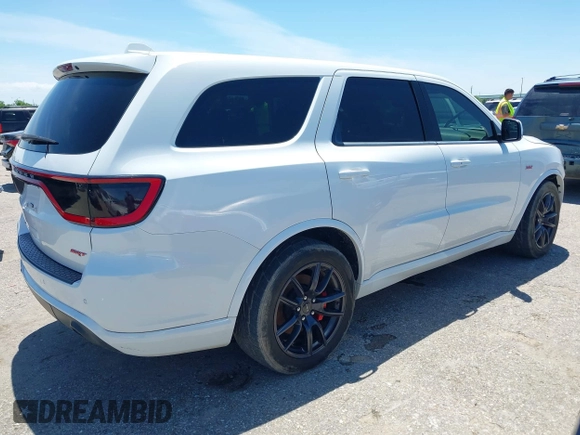 2018 Dodge Durango SRT with VIN 1C4SDJGJ4JC341550, listed as a IAAI auction lot 42147955 with 86,503 mi miles and . Bid and sale history available at DreamBid. Image 4.