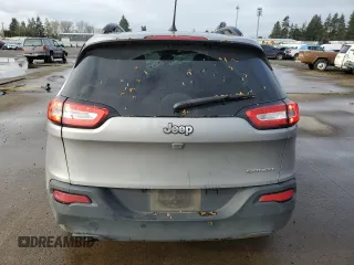 2016 Jeep Cherokee Sport with VIN 1C4PJLAB0GW189379, listed as a Copart auction lot 52239555 with 142,699 mi miles and Salvage title. Bid and sale history available at DreamBid. Image 6.