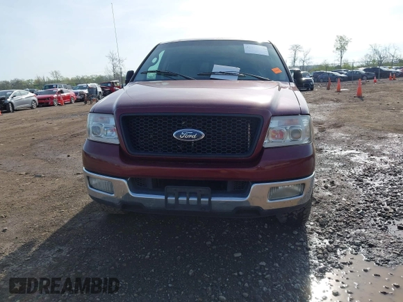 2005 Ford F-150 XLT with VIN 1FTPX12505FB69853, listed as a IAAI auction lot 42092756 with 330,699 mi miles. Bid and sale history available at carsss.com. Image 12.