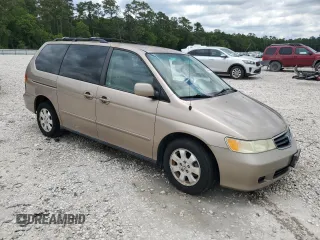 2004 Honda Odyssey EX z VIN 5FNRL18684B118446, wystawiony jako Copart lot #56468445 z przebiegiem 153 848 mil mil oraz Szkoda całkowita • Salvage title. Historia ofert i sprzedaży dostępna na DreamBid. Obrazek 4.