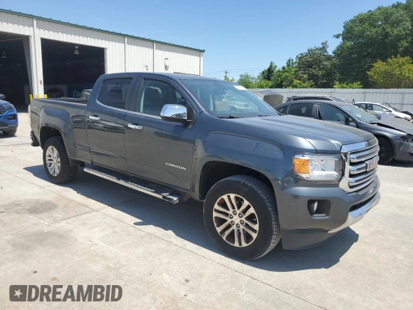 2015 GMC Canyon 4WD SLT z VIN 1GTG6CE30F1182562, wystawiony jako Copart lot #55382605 z przebiegiem 97 183 mil mil oraz Szkoda całkowita • Salvage title. Historia ofert i sprzedaży dostępna na DreamBid. Obrazek 4.