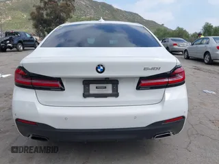 2021 BMW 5 Series 540i z VIN WBA53BJ07MWW92703, wystawiony jako IAAI lot #41868430 z przebiegiem Nie podano mil oraz . Historia ofert i sprzedaży dostępna na DreamBid. Obrazek 16.