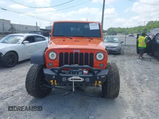 2015 Jeep Wrangler Unlimited Rubicon z VIN 1C4BJWFG4FL598033, wystawiony jako IAAI lot #42435523 z przebiegiem 134 202 mil mil oraz . Historia ofert i sprzedaży dostępna na DreamBid. Obrazek 12.