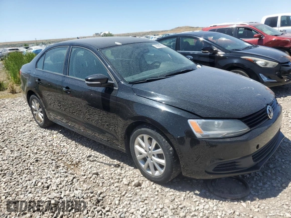 2012 Volkswagen Jetta SE with VIN 3VWDX7AJ4CM418234, listed as a Copart auction lot 60942805 with 143,652 mi miles and Clean title. Bid and sale history available at DreamBid. Image 4.
