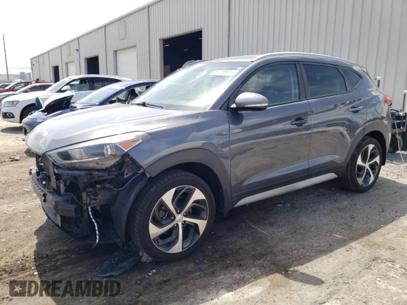 2018 Hyundai Tucson Sport z VIN KM8J33ALXJU764322, wystawiony jako Copart lot #59739985 z przebiegiem 79 882 mil mil oraz Szkoda całkowita • Salvage title. Historia ofert i sprzedaży dostępna na DreamBid. Obrazek 1.