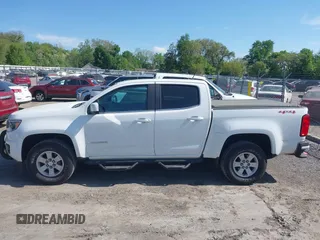 2020 Chevrolet Colorado 4WD Work Truck z VIN 1GCGTBEN4L1227194, wystawiony jako IAAI lot #42256116 z przebiegiem 76 635 mil mil oraz . Historia ofert i sprzedaży dostępna na DreamBid. Obrazek 14.