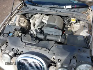 2005 Jaguar S-Type with VIN SAJWA01T45FN28372, listed as a IAAI auction lot 41461878 with Not Provided miles and . Bid and sale history available at DreamBid. Image 9.