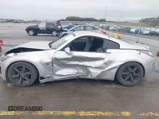 2003 Nissan 350Z Touring z VIN JN1AZ34E43T014247, wystawiony jako IAAI lot #42120812 z przebiegiem 112 263 mil mil oraz . Historia ofert i sprzedaży dostępna na DreamBid. Obrazek 14.