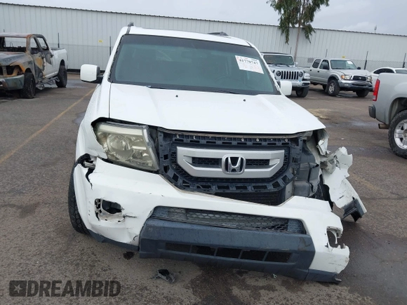 2011 Honda Pilot EX-L z VIN 5FNYF3H75BB027767, wystawiony jako IAAI lot #41770747 z przebiegiem 214 587 mil mil oraz . Historia ofert i sprzedaży dostępna na DreamBid. Obrazek 13.