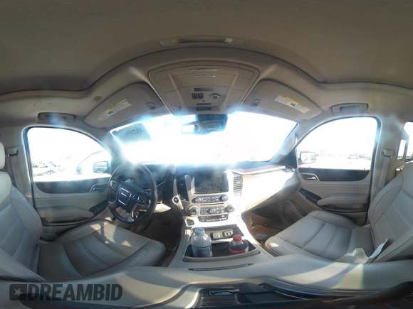 2020 GMC Yukon XL Denali with VIN 1GKS1HKJ6LR282854, listed as a IAAI auction lot 41717072 with 56,715 mi miles and . Bid and sale history available at DreamBid. Image 19.