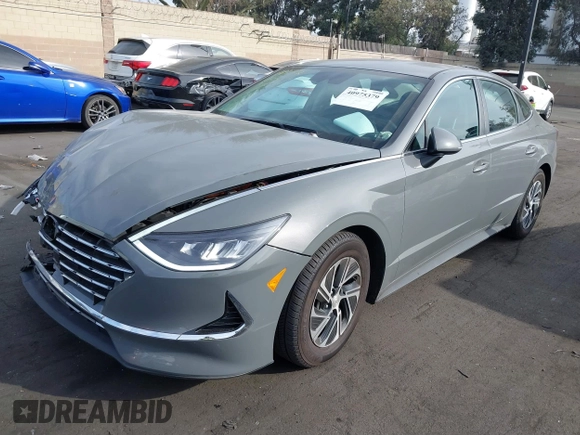 2022 Hyundai Sonata Hybrid Blue with VIN KMHL24JJ5NA037502, listed as a IAAI auction lot 40975379 with 69,018 mi miles. Bid and sale history available at carsss.com. Image 2.