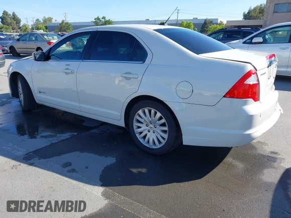 2012 Ford Fusion Hybrid z VIN 3FADP0L3XCR276182, wystawiony jako IAAI lot #42260450 z przebiegiem 133 567 mil mil oraz . Historia ofert i sprzedaży dostępna na DreamBid. Obrazek 3.