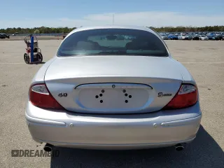 2002 Jaguar S-Type w/Sport z VIN SAJDA03P82GM38431, wystawiony jako Copart lot #54934795 z przebiegiem 42 744 mil mil oraz Szkoda całkowita • Salvage title. Historia ofert i sprzedaży dostępna na DreamBid. Obrazek 6.