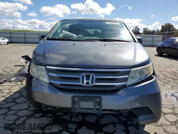 2011 Honda Odyssey EX-L with VIN 5FNRL5H64BB050425, listed as a Copart auction lot 49101795 with 192,238 mi miles and Salvage Title. Bid and sale history available at DreamBid. Image 5.