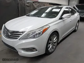 2013 Hyundai Azera with VIN KMHFH4JG1DA330604, listed as a IAAI auction lot 41966248 with 126,554 mi miles. Bid and sale history available at carsss.com. Image 2.