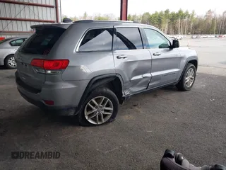2018 Jeep Grand Cherokee Laredo E with VIN 1C4RJFAG7JC130313, listed as a IAAI auction lot 41969759 with 177,017 mi miles and . Bid and sale history available at DreamBid. Image 4.