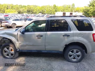 2008 Ford Escape XLT with VIN 1FMCU93198KE17879, listed as a IAAI auction lot 40125825 with 214,373 mi miles and . Bid and sale history available at DreamBid. Image 15.