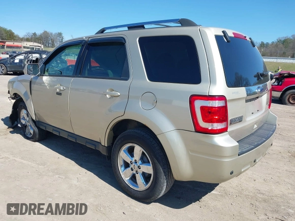 2011 Ford Escape Limited with VIN 1FMCU9EG7BKA25766, listed as a IAAI auction lot 41810992 with 74,226 mi miles. Bid and sale history available at carsss.com. Image 3.
