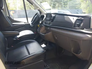 2020 Ford Transit Cargo z VIN 1FTBR1C8XLKA04894, wystawiony jako IAAI lot #42176726 z przebiegiem 84 154 mil mil oraz . Historia ofert i sprzedaży dostępna na DreamBid. Obrazek 5.