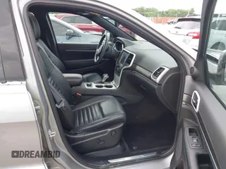 2018 Jeep Grand Cherokee Limited with VIN 1C4RJFBG7JC266715, listed as a IAAI auction lot 42562005 with 101,999 mi miles and . Bid and sale history available at DreamBid. Image 5.