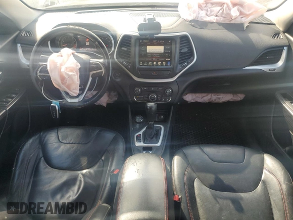 2014 Jeep Cherokee Trailhawk with VIN 1C4PJMBS3EW127928, listed as a Copart auction lot 63825865 with 172,712 mi miles and Salvage title. Bid and sale history available at DreamBid. Image 8.