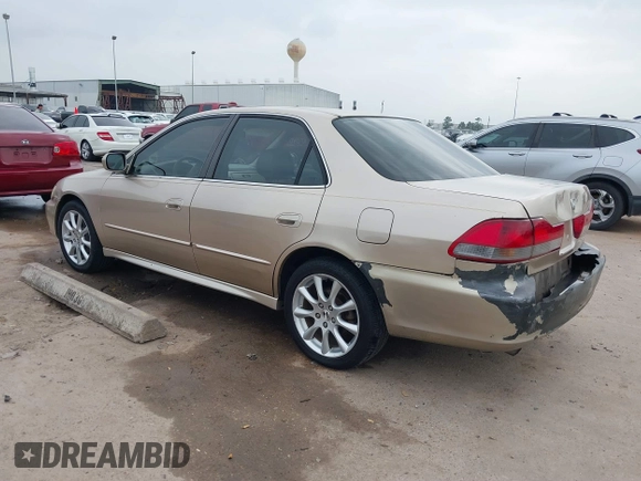 2001 Honda Accord EX z VIN 1HGCG165X1A077702, wystawiony jako IAAI lot #41770556 z przebiegiem 149 516 mil mil oraz . Historia ofert i sprzedaży dostępna na DreamBid. Obrazek 3.