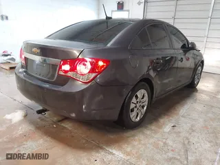 2014 Chevrolet Cruze LS with VIN 1G1PB5SH5E7460979, listed as a IAAI auction lot 41312075 with 123,580 mi miles. Bid and sale history available at carsss.com. Image 4.
