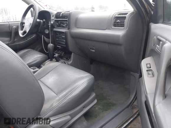 1998 Isuzu Rodeo S z VIN 4S2CM58W6W4336183, wystawiony jako IAAI lot #41874570 z przebiegiem 162 097 mil mil oraz . Historia ofert i sprzedaży dostępna na DreamBid. Obrazek 5.