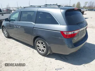 2012 Honda Odyssey EX-L with VIN 5FNRL5H69CB047425, listed as a IAAI auction lot 42064979 with 242,409 mi miles and . Bid and sale history available at carsss.com. Image 3.