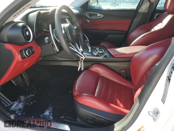 2019 Alfa Romeo Giulia Ti z VIN ZARFANBN0K7608050, wystawiony jako Copart lot #89119965 z przebiegiem 80 559 mil mil oraz Szkoda całkowita • Salvage title. Historia ofert i sprzedaży dostępna na DreamBid. Obrazek 7.