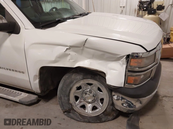2014 Chevrolet Silverado 1500 Work Truck with VIN 1GCVKPEH5EZ249288, listed as a IAAI auction lot 41479579 with 141,549 mi miles and . Bid and sale history available at DreamBid. Image 6.