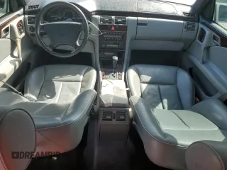 1997 Mercedes-Benz E-Class with VIN WDBJF55F2VJ024815, listed as a Copart auction lot 75228024 with 184,398 mi miles and Non Repairable. Bid and sale history available at carsss.com. Image 8.