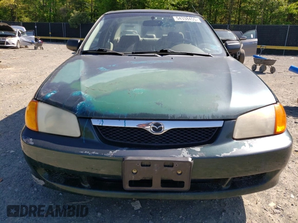 1999 Mazda Protege DX with VIN JM1BJ2223X0139775, listed as a Copart auction lot 54338455 with 63,198 mi miles and Salvage Title. Bid and sale history available at DreamBid. Image 5.