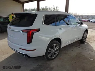 2020 Cadillac XT6 FWD Premium Luxury with VIN 1GYKPCRS3LZ137180, listed as a IAAI auction lot 41680583 with 68,937 mi miles. Bid and sale history available at carsss.com. Image 4.