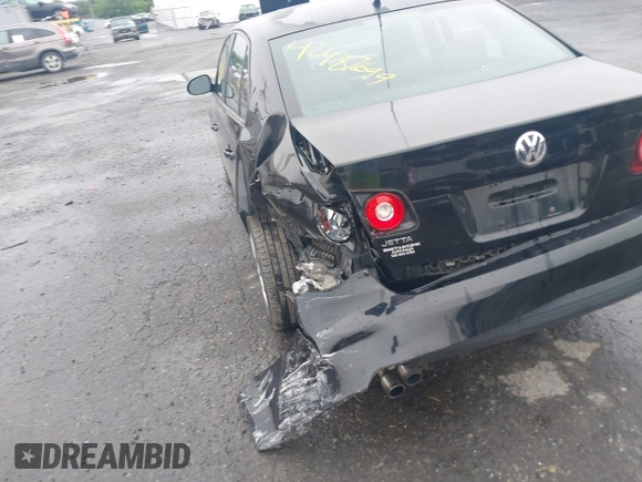 2010 Volkswagen Jetta Limited Edition z VIN 3VWAZ7AJ3AM096583, wystawiony jako IAAI lot #42487699 z przebiegiem 194 527 mil mil oraz . Historia ofert i sprzedaży dostępna na DreamBid. Obrazek 6.