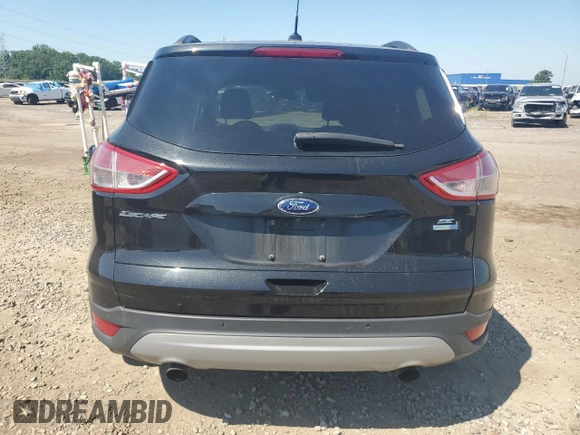 2014 Ford Escape SE with VIN 1FMCU9GX1EUD71589, listed as a Copart auction lot 63191785 with 112,579 mi miles and Clean title. Bid and sale history available at DreamBid. Image 6.
