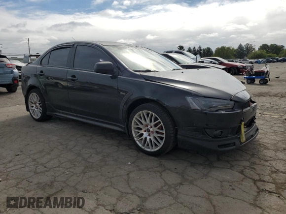 2009 Mitsubishi Lancer ES with VIN JA3AU26U49U002269, listed as a Copart auction lot 73992004 with 144,134 mi miles and Salvage Title. Bid and sale history available at DreamBid. Image 4.