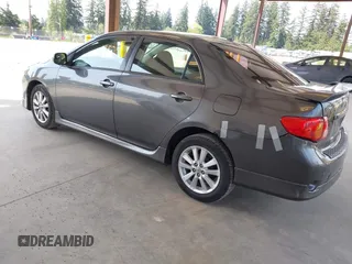 2009 Toyota Corolla with VIN 1NXBU40E79Z133873, listed as a IAAI auction lot 42132035 with 232,578 mi miles. Bid and sale history available at carsss.com. Image 3.