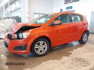 2012 Chevrolet Sonic LT z VIN 1G1JD6SB1C4230890, wystawiony jako IAAI lot #41265634 z przebiegiem 161 886 mil mil oraz . Historia ofert i sprzedaży dostępna na DreamBid. Obrazek 2.