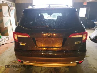 2020 Honda Pilot Touring 8-Passenger with VIN 5FNYF6H90LB043055, listed as a Copart auction lot 85194544 with 82,144 mi miles and Salvage Title. Bid and sale history available at DreamBid. Image 6.